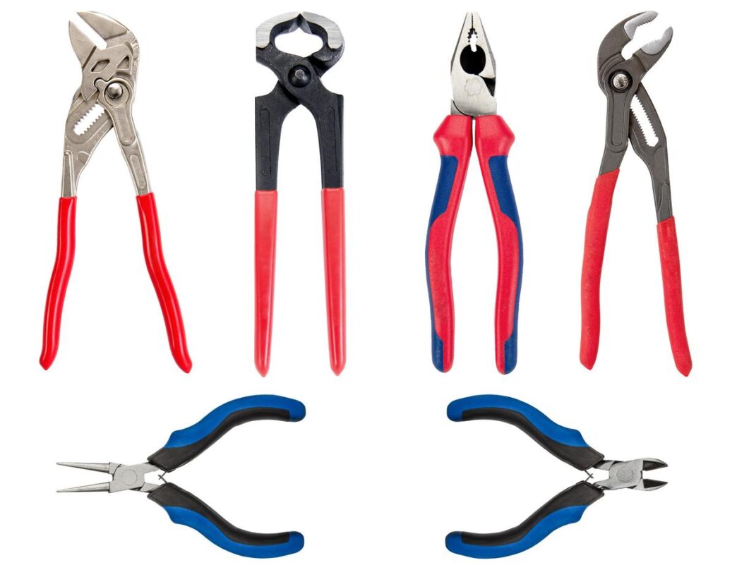 Knipex pliers artfully arranged on a polished workbench, showcasing superior craftsmanship and design.